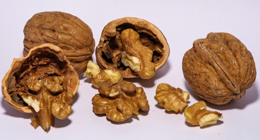 3 cracked walnuts as healthy savoury snacks for menopausal women.